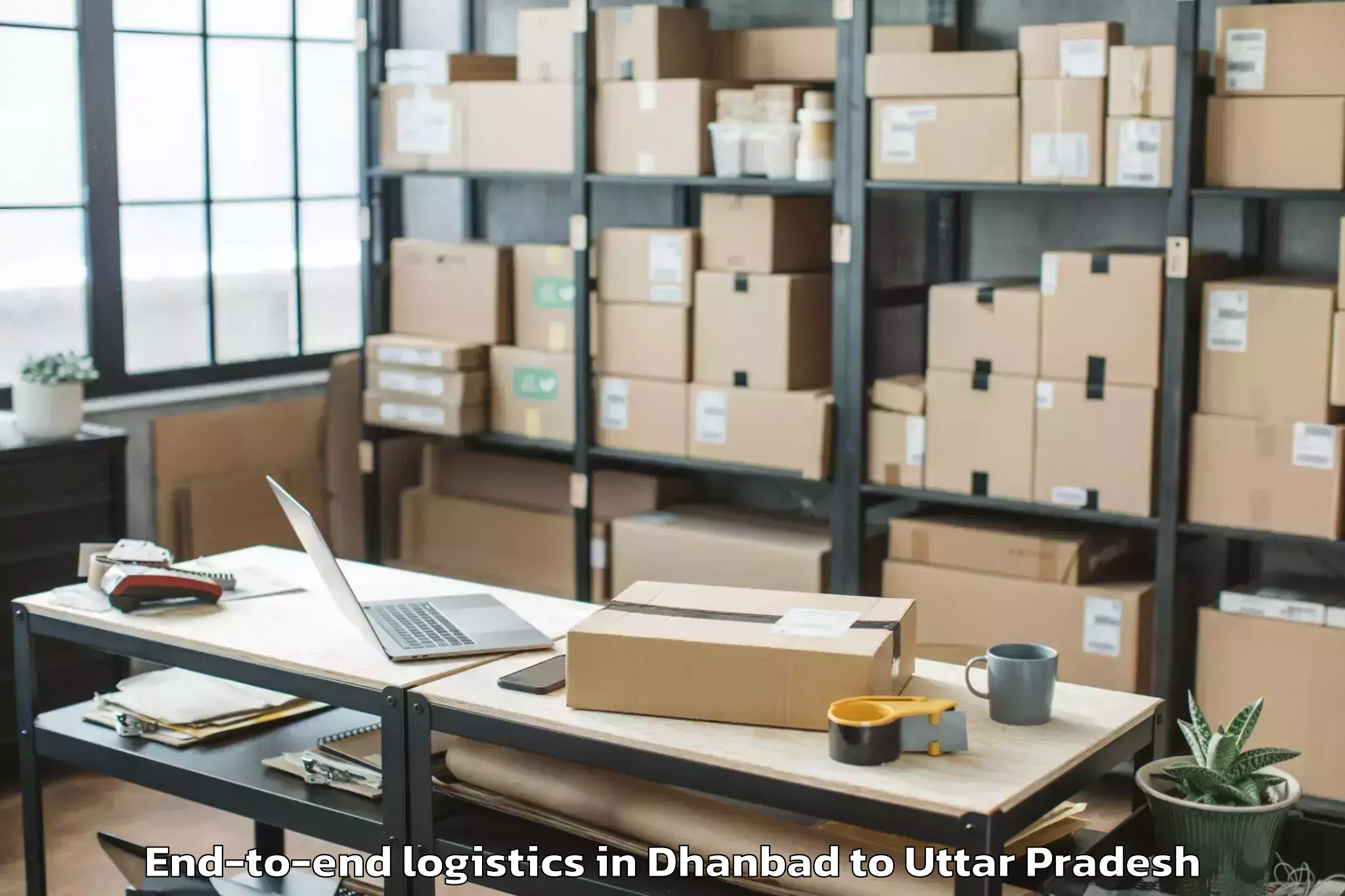 Hassle-Free Dhanbad to Muhammadabad Gohna End To End Logistics